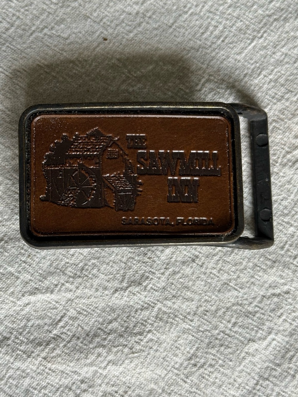 Vintage the Sawmill Inn belt buckle